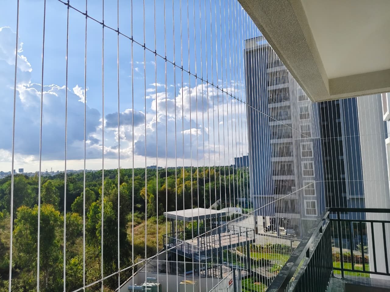 Invisible grill balcony installation completed by Jhansi in Hyderabad
